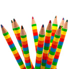 A group of sharpened rainbow pencils multi-colored pencils with 4 colors in 1 pencil with rainbow-colored striped barrels, arranged upright against a plain white background.