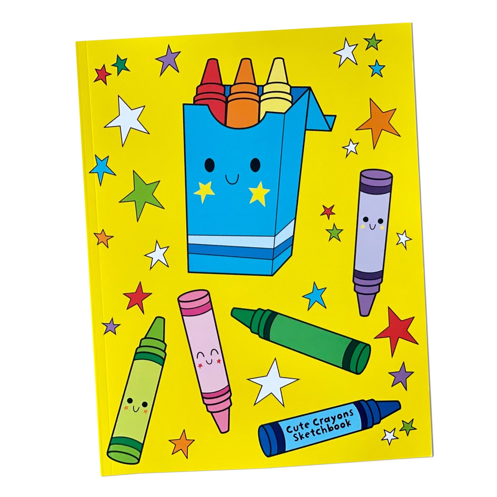 Sketchbook with colorful crayons and a box on a yellow background with stars