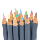 Watercolor pencils with pastel colors against a white background