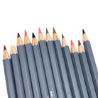 Set of 12 skin tone colored watercolor pencils against a white background
