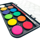 Set of watercolor paints with a brush on a white background