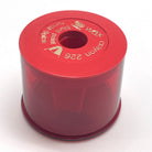 A red KUM jumbo crayon or jumbo pencil sharpener on a white background